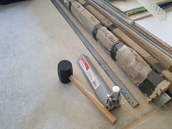 Drywall square galvanized 9ft cornerbead (89) and corner install tool. 1