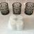 Three Smoked Glass Tealight Candle Holders with Box of White Candles 1 thumbnail
