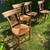 FOUR VINTAGE MATCHING WOOD CHAIRS WITH RUSH SEATS AND CARVED DEER 1 thumbnail