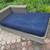 Faux wicker patio lounge chair day bed with blue cushion 3 thumbnail