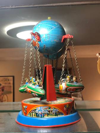 Antique spinning globe wind-up toy 1