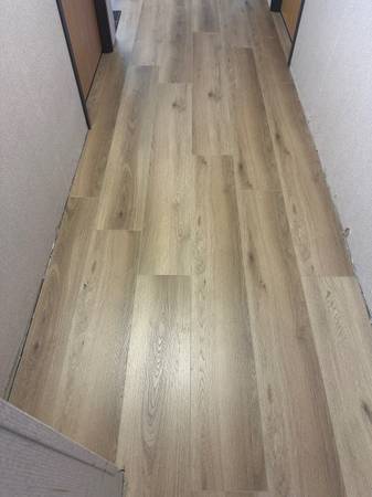 Waterproof vinyl plank flooring 20mil pad attached 7mm @ $2.49/sf 1