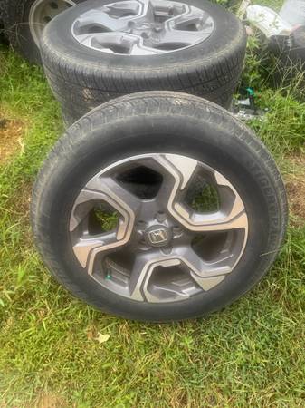235/60/r18 set of tires and rims(HONDA) 1