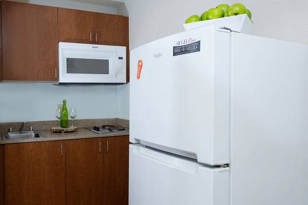Flat Screen TVs, Microwave, Free Premium Cable TV 1