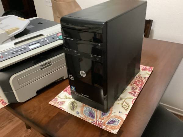 Tower, printer, two and laptops 1