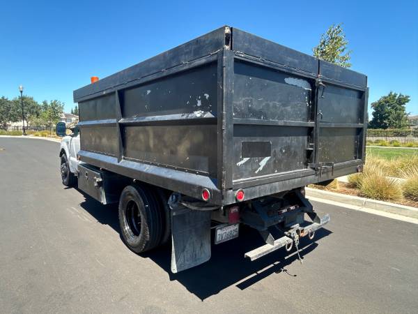 Camión volquete Ford F350 super de 2006 - $10,90063438605753345123