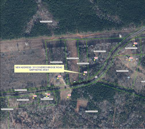 1.29-acre piece of unrestricted land, mostly wooded, in Gaffney, SC 1