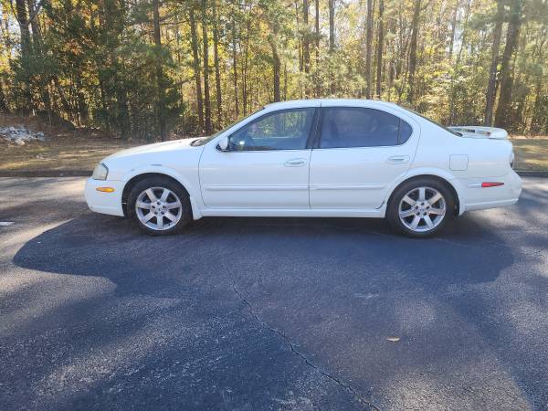 HAS WARRANTY-GREAT RUNNING, MECHANICALLY SOUND MAXIMA 1
