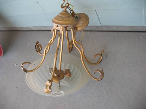 Chandelier or ceiling light. 1