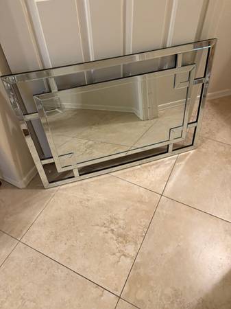 Art Deco style rectangular wall mirror with a layered, geometric mirrored frame 1