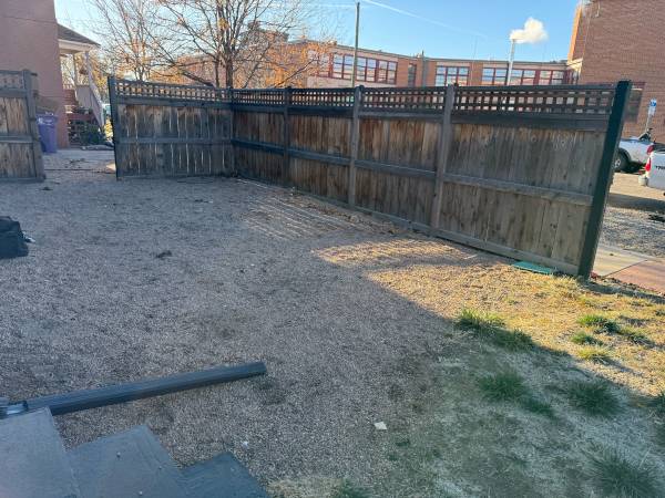 Concrete,fence,sprinklers and landscaping 1