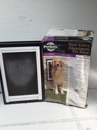 Pet Safe Wall Entry Aluminum Pet Door. In Great Condition. 1