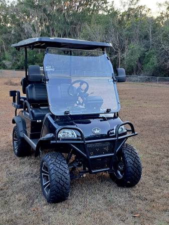 LIKE NEW 2024 EVOLUTION FORESTER 4 GOLF CART 1