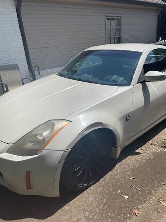 Nissan 350z blanca del 2004 en venta Manual (solo efectivo // solo compradores serios - $6,900 (Alpharetta))63620923441667123