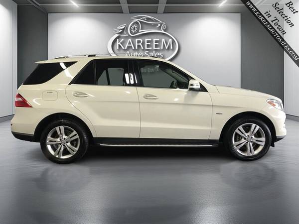 2012 Mercedes-Benz ML 350 BlueTEC AWD con cámara, navegación, techo solar y asientos calefactados - $11,14063470759704707123