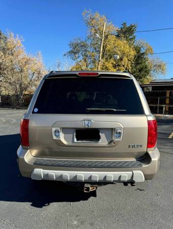 2004 Gold Honda Pilot EX-L - $5,800 (Denver)63621874047489124