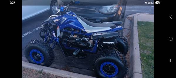 Like new 200cc blue Atv 1