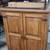 Deep Armoire. All natural wood w/rustic iron hinges, handles n base. 1 thumbnail
