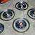 1950 OLDSMOBILE FUTURAMIC 88 HUBCAPS W/TRIM RINGS 4 thumbnail