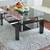 Black Glass Top Cocktail Coffee Table with Wooden Legs Chrome Details 3 thumbnail