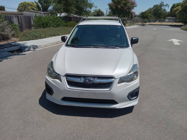 2012 Subaru Impreza AWD automático ¡Acaba de pasar la prueba de emisiones! 4 cilindros! ¡Funciona bien, mira! - $4,250 (hayward / castro valley)63623991800579124