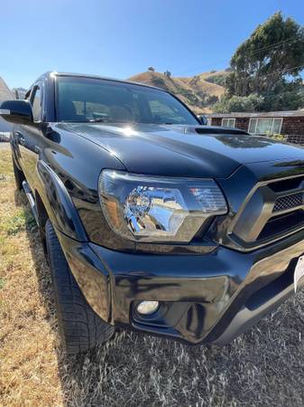 Tacoma larga de 2013 Toyota. PreRunner V6. TRD Sport - $12,500 (hollister)63624065809539123