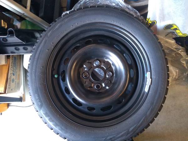 185/55R15 82H winter/snow tires on steel rims 1