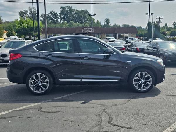 2016 BMW X4 xDrive28i - $19,850 (Lujo de segunda mano)63442170775043123