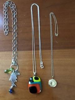 Three necklaces, different designs, fundraising for LA fire victims 1