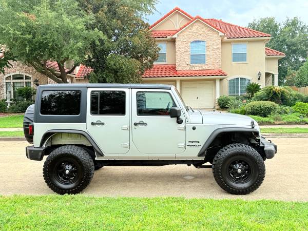 2012 Jeep Wrangler Unlimited Sport clean title 1