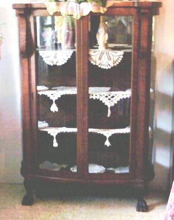 Antique China Cabinet has Claw feet Curved glass 1