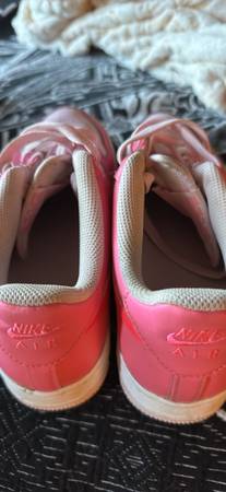 Pink Nikes size 8 1