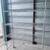 Wire Shelving Unit with Wheels: 4 shelves.  can deliver 3 thumbnail