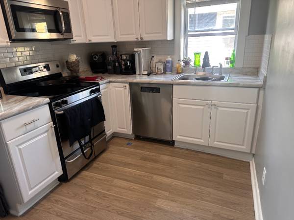 1 (2)  Bedroom 1 bathroom with tub Newly Updated 1