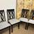 Four (4) Black dining chairs with gray upholstered seats 1 thumbnail