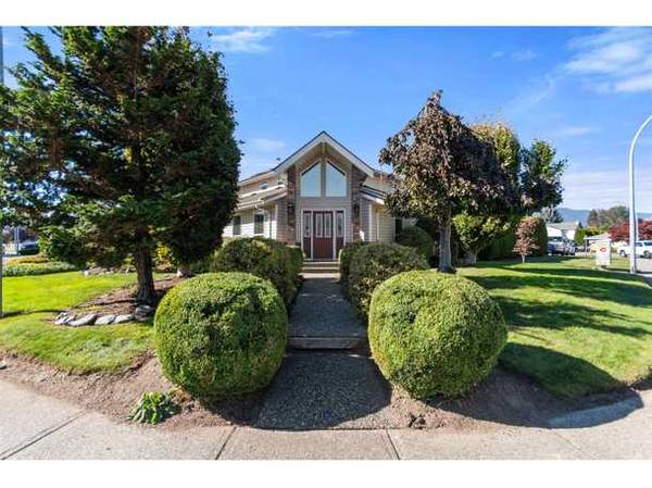 2-storey home nestled on a desirable corner lot in the heart of Sardis 1