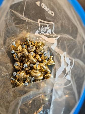 Lots of brass cabinet knobs 1
