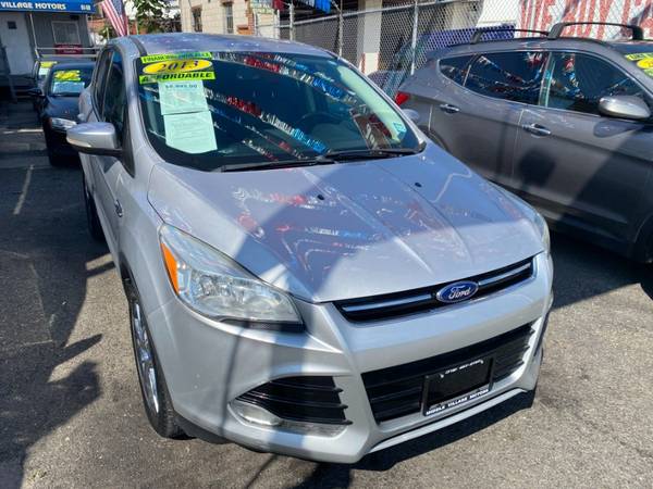 An Impressive 2013 Ford Escape with 102,554 Miles-queens - $7,995 (Middle Village)63618038991873122