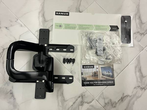 Full-Motion Wall Mount for 40”-50” TV - $30 (Tamarac)63471413666947121
