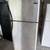 EXCELLENT RUNNING  21 CU. FT. STAINLESS STEEL FRIDGE. RUNS LIKE BRAND NEW. HAS E 1 thumbnail