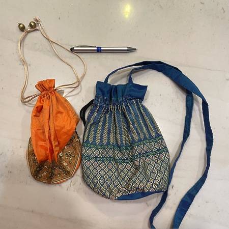 Indian draw string potli satchel with gold embroidery 1