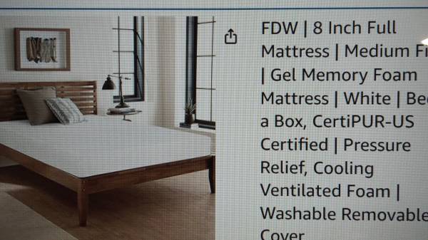 A bed frame and mattress 1