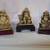 Collection of  9 Buddah figurines 1 thumbnail