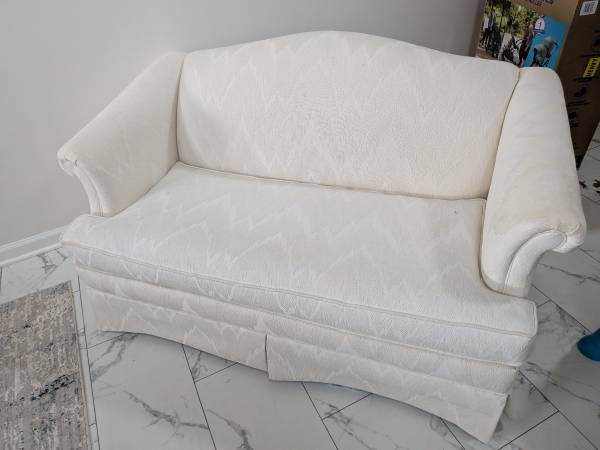 Two cream colored couches 1