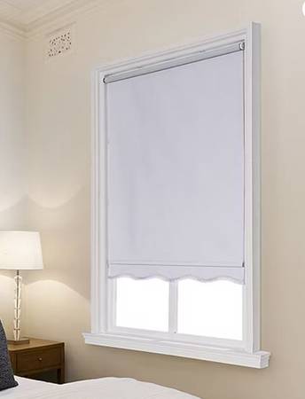 One (1) White 35" Fringed Cordless Thermal Blackout Roller Shade. 1
