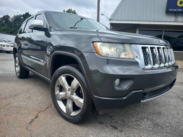 2011 MINT JEEP GRAND CHEROKEE OVERLAND.. TOTALMENTE EQUIPADO - $6,999 (Snellville)63621001775489123