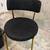 Chair with gold trim and black textured fabric 1 thumbnail