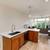 The spacious living room featuring new custom Bali Cellular Shades se 5 thumbnail