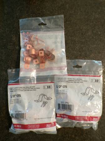 1/2" CTS Two Hole Pipe Strap Copper w/ Nails 1