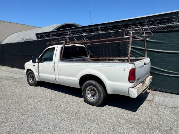 2000 ford f250 5.4 v8 funciona excelente - $1,500 (belmont)63613301851267121